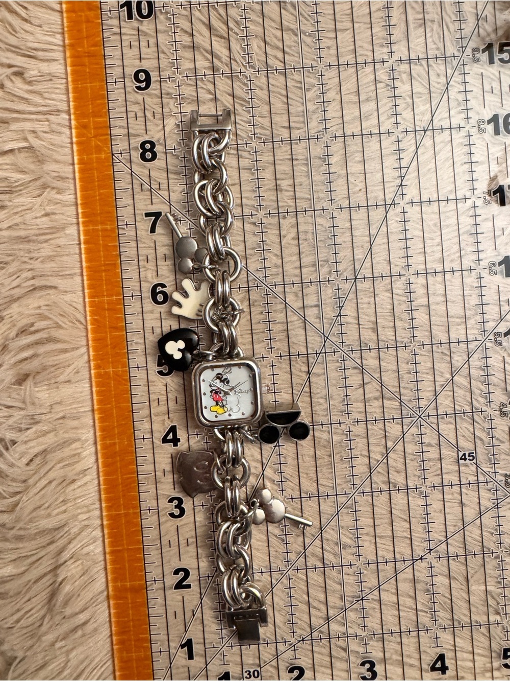 Disney Silver-tone Charm Bracelet Watch with Black and White Enamel Charms